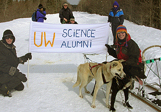 [One dog, one sled, one hand-made UW sign]
