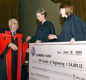 [Giant cheque for $54,001.12]