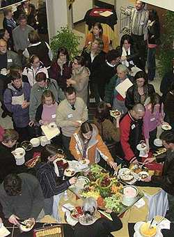 [Aerial view of crowd at buffet in ML lobby]
