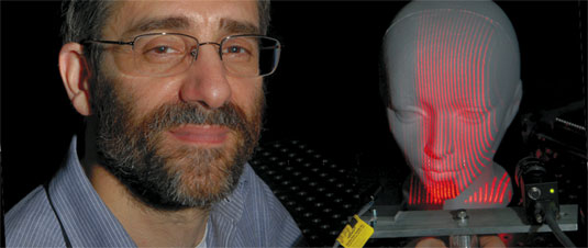 [The human head and the laser artifact]