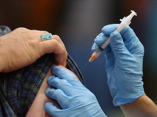 person getting a flu shot