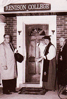 [Bishop and board members at the front door]