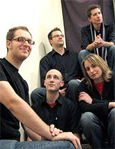 [Five members of ensemble, in informal pose]