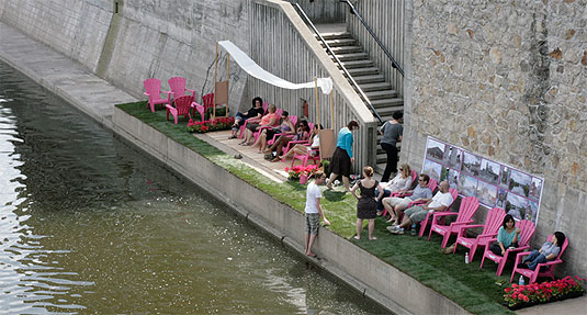 [Fuchsia deck chairs on the towpath]