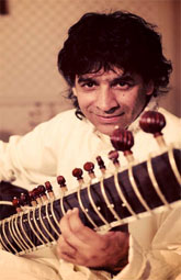 [Player and sitar]