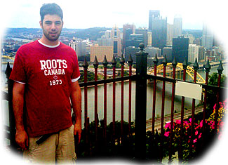 [In front of Pittsburgh skyline]