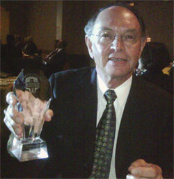 [Thiessen with crystal trophy]