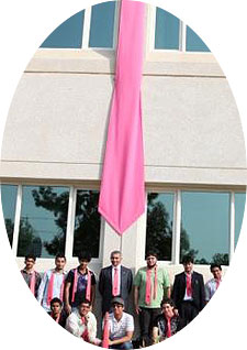 [Under a giant pink tie]