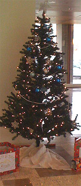 [Tree, with boxes underneath for gifts]