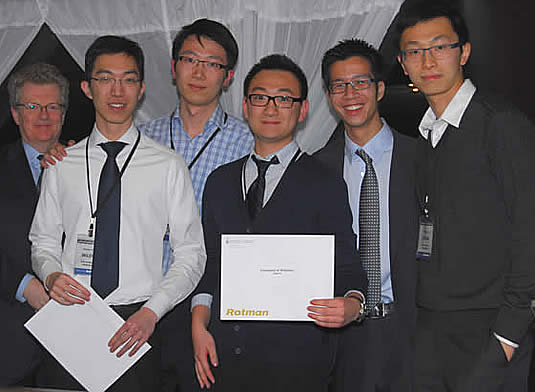Waterloo team members pose with Rotman competition organizers.