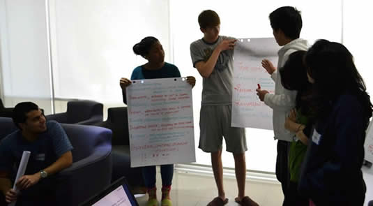Students at the Waterloo UAE campus do some brainstorming.