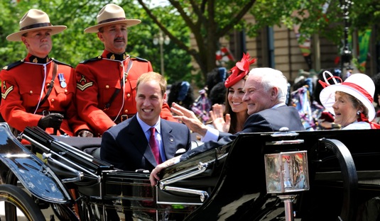 HRH Prince William (left), Katherine, Governor General David Johnston, and Sharon Johnston in carriage.