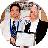 Lawrence Wong accepts the MEMSCAP microsystems design award.
