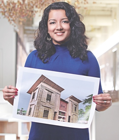 Architecture student Prithula Prosun with a photo of her LIFT house.
