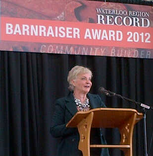 Ginny Dybenko speaks at the Barnraiser Award luncheon.