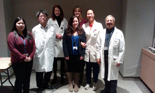 Pictured are (front row) Stacy Yuen, Dr. Chow, Rachel McDonald, Philiz Goh, and Dr. Cyril Danjoux, and (back row) Dr. Elizabeth Barnes and Lori Holden.