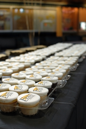 Rows of Federation of Students cupcakes on display in the SLC Great Hall.