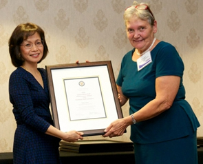 Dean of Engineering Pearl Sullivan and June Lowe pose with her 2012 Engineering Outstanding Staff Performance Award in the technical category.