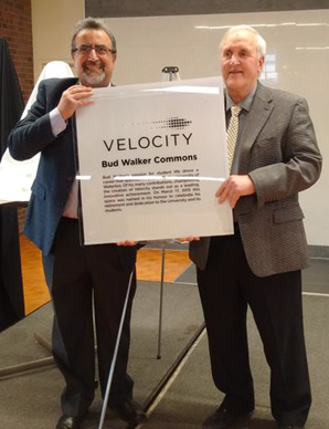 President Feridun Hamdullahpur and Bud Walker with a poster for Bud Walker Commons.