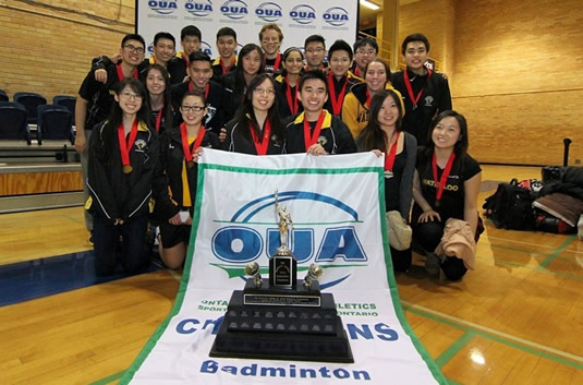 The Waterloo Warriors badminton team with their trophy.