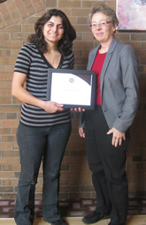 Rania Al-Hammoud stands with Sue Horton and her award.