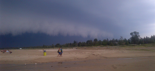A powerful stormfront roars along Sauble Beach on Friday, July 19.