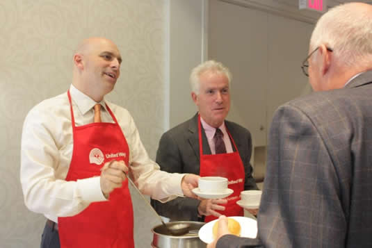 Tim Jackson and Ken McGillivray serve soup.