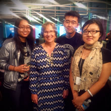 Cindy Forbes poses with actuarial science students in the Davis Centre.