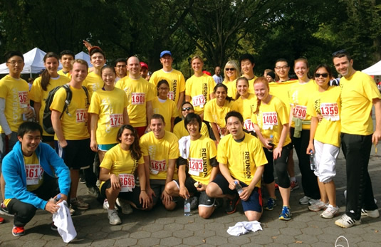 Participants in the Terry Fox Central Park Run in yellow uWaterloo shirts.