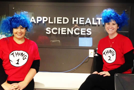 Applied Health Sciences staff dressed as Thing 1 and Thing 2.
