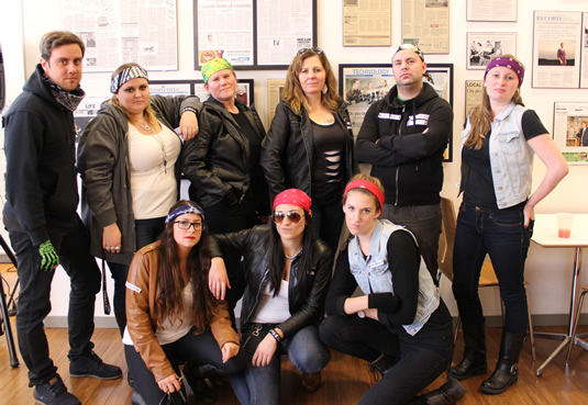 IQC's Communications and Strategic Initiatives team dressed as bikers.